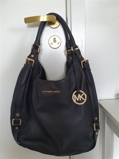 michael kors väska svart guld|michael kors handbags dam.